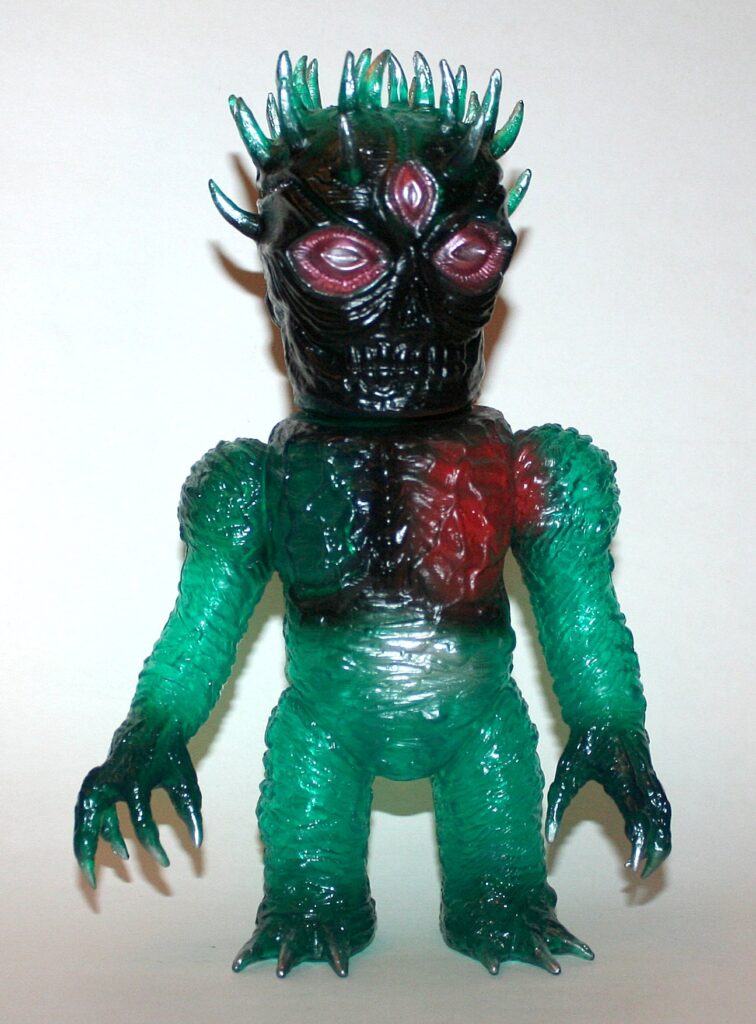 Skull Head Butt Clear Green Plant Man Skull-X Sofubi Figure