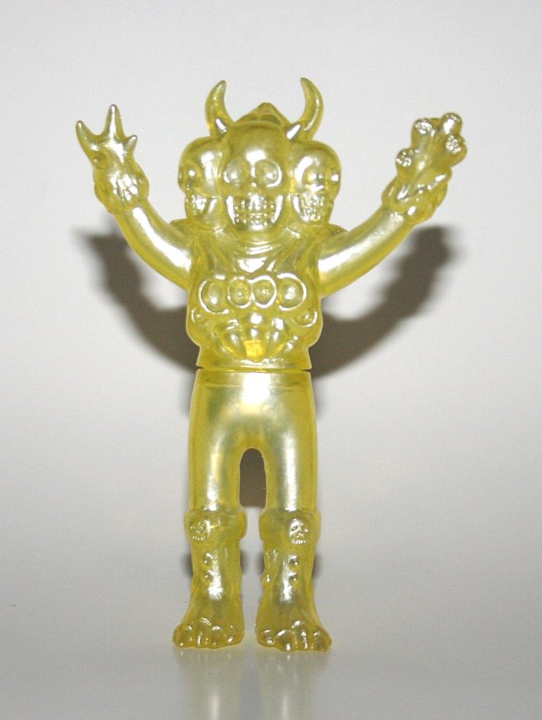 Skull Toys Silver on Clear Yellow Mini Dokurocks