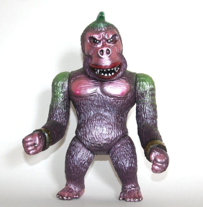 Skull Head Butt Green and Purple Astro Kong