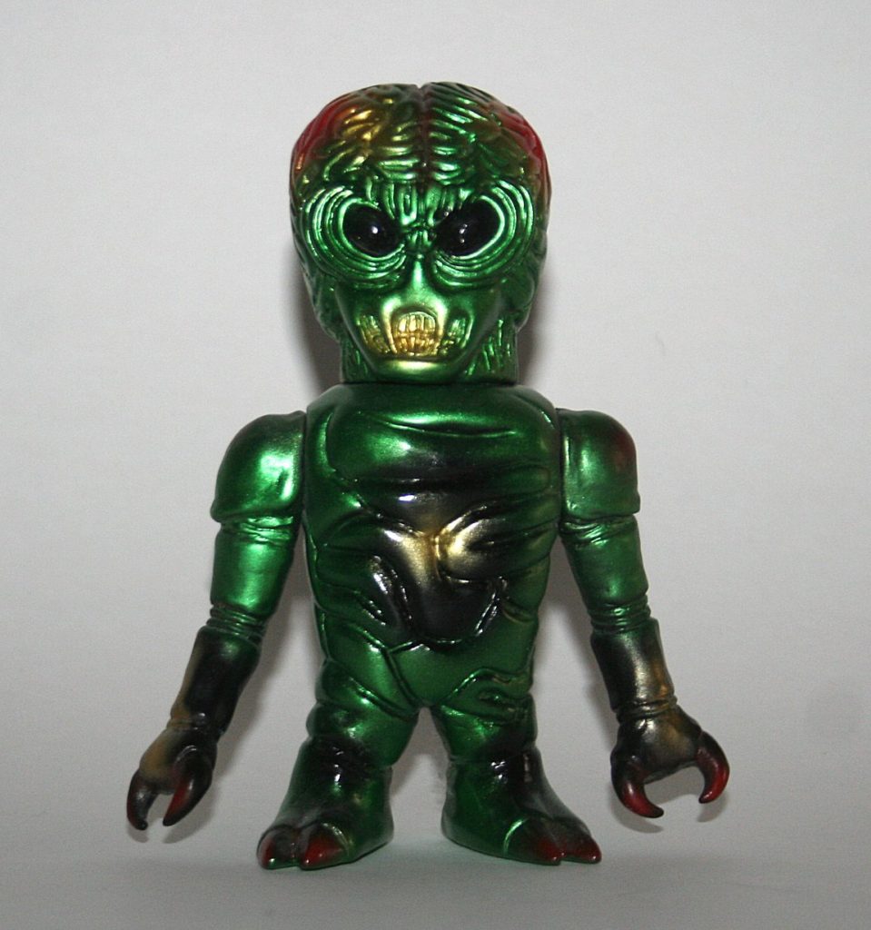 Skull Head Butt Metallic Green Tolueneman