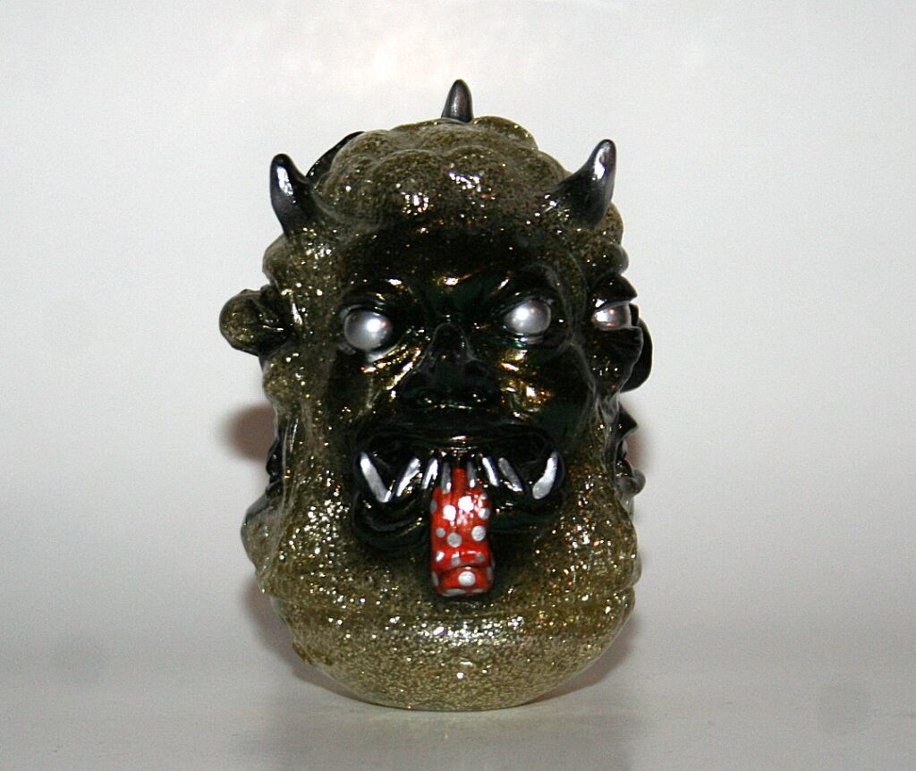 The Devils Kaiju Heavy Metal Alchemist God Head