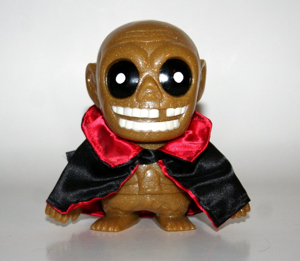 Uncut Gold Lame Caped Bombom Mud Tar Boy
