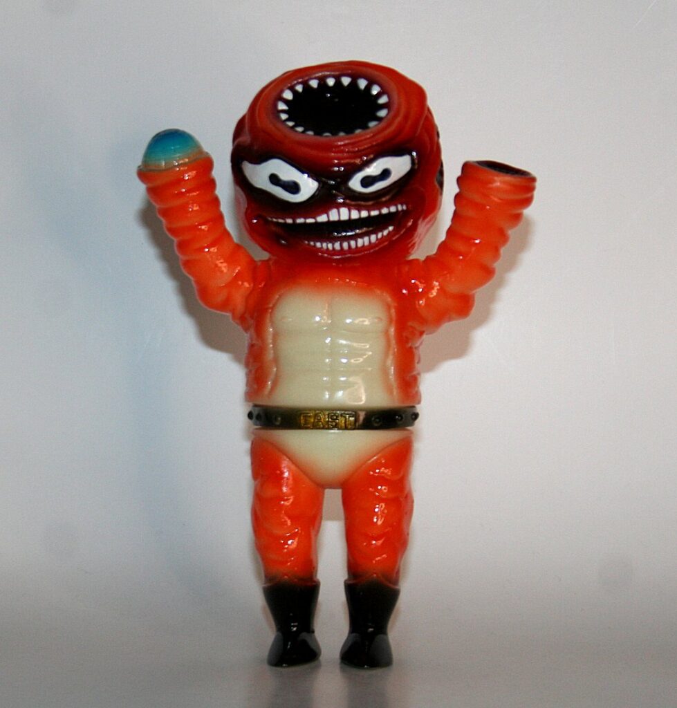 Cop A Squat Toys Orange on Glow Vinge