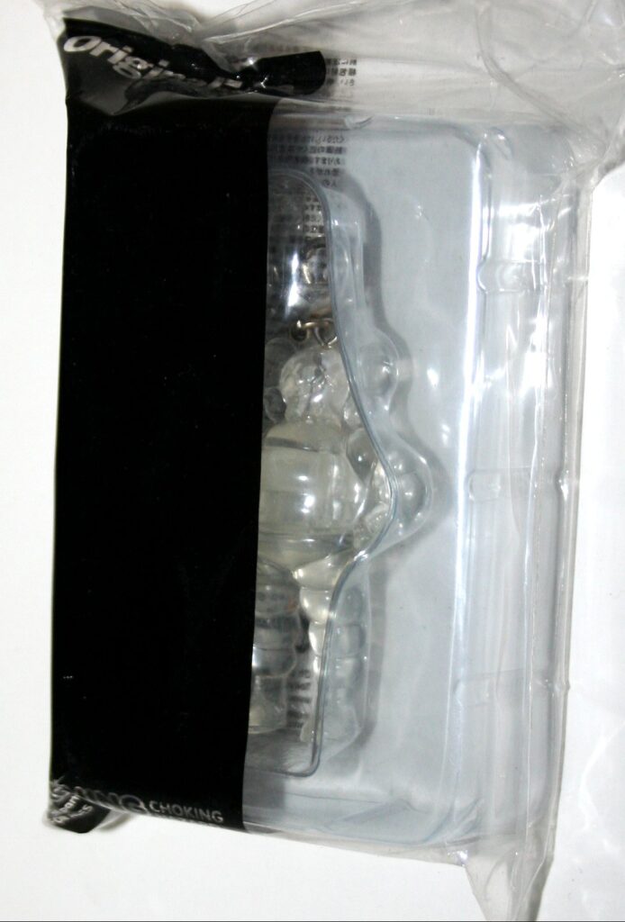 KAWS Tokyo First Clear CHUM Keychain — Vicious Fun