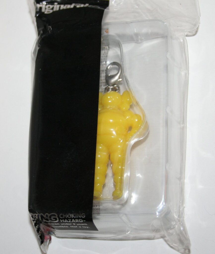 KAWS Tokyo First Yellow CHUM Keychain