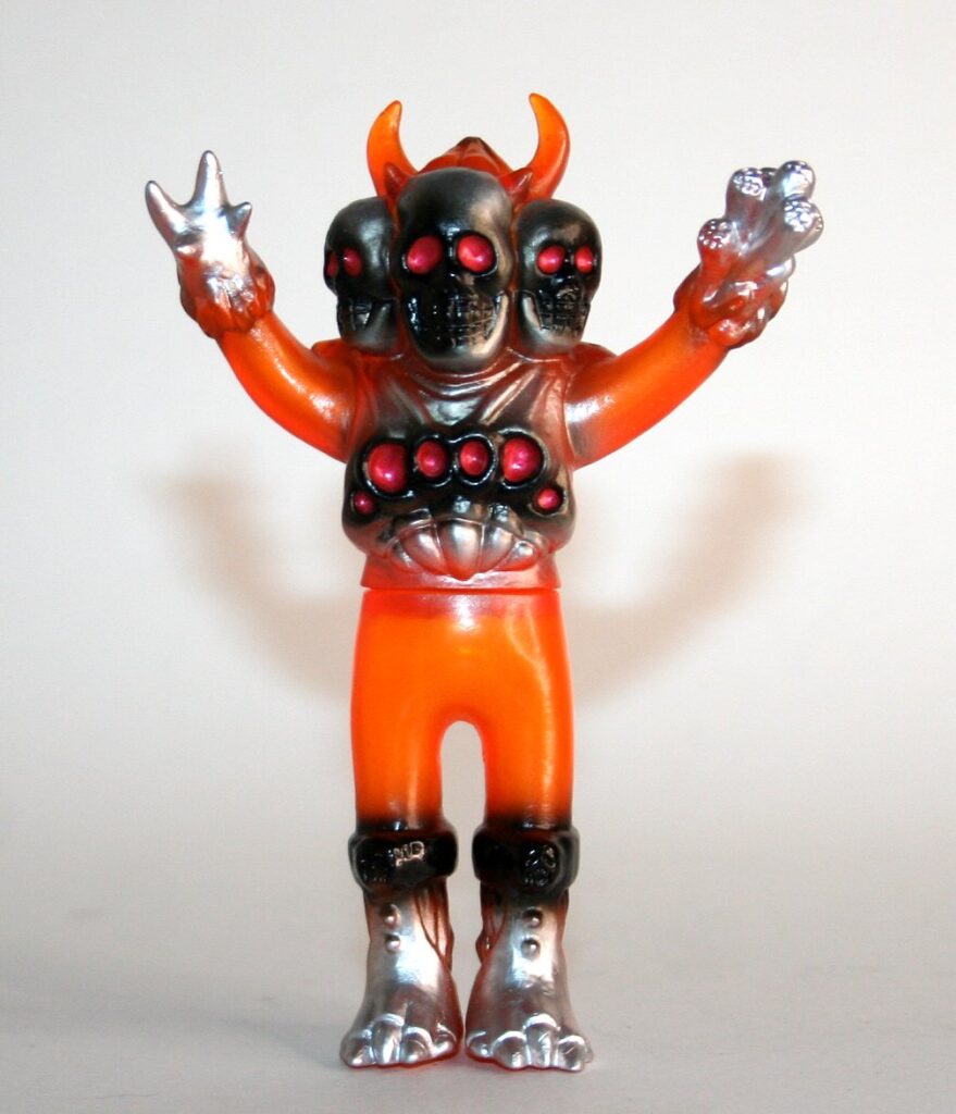 Skull Toys Clear Orange Mini Dokurocks