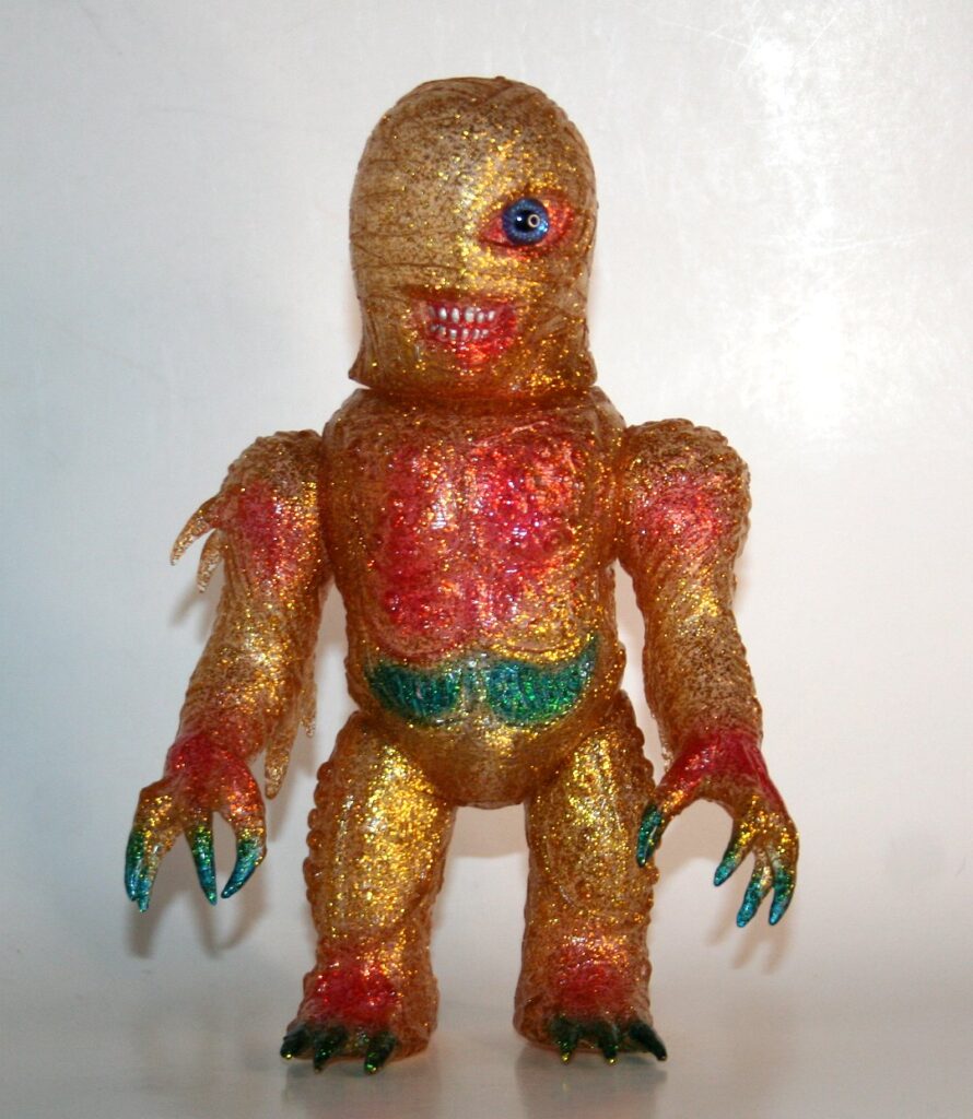 Skull Head Butt Gold Lame Mummy-X