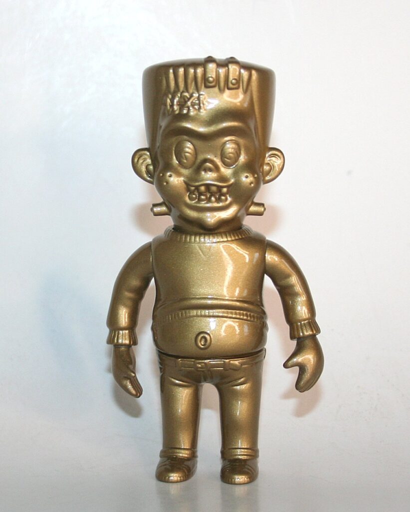 Headlock Studio Medium Size Solid Gold Frankie Sofubi Figure