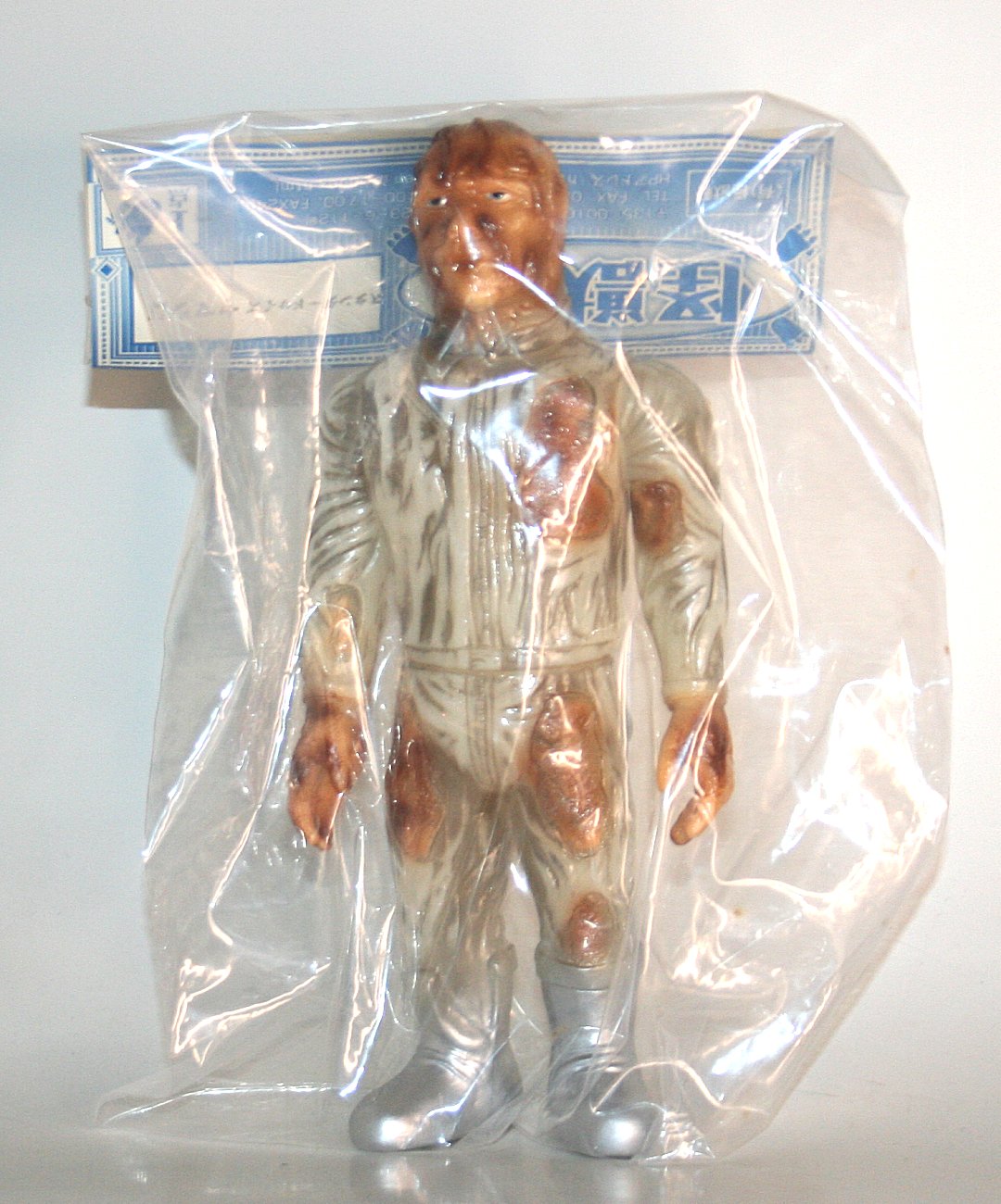 KaijuKen Radiation Burn Yamashiro sofubi in milky white vinyl with brown and silver paint