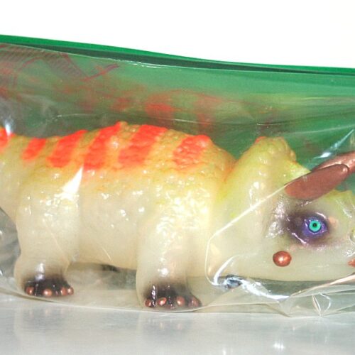 Bombastic Plastic Gold on Glow Gordon